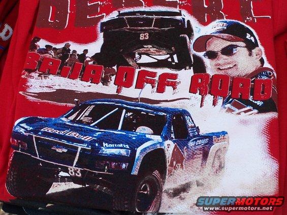 Graphic t-shirt with Baja Off Road theme, showing a blue Red Bull race truck and a black truck