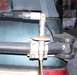 1995 Ford Bronco - A CB antenna mount is bolted to the rear of the vehicle, near the trailer hitch.