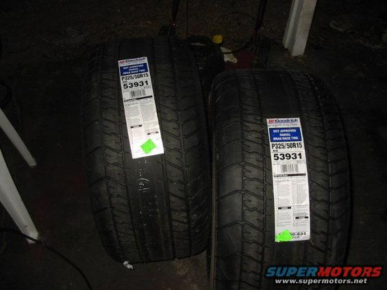 Two BFGoodrich P325/50R15 radial drag race tires with labels