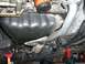 1996 Ford Probe - The underside of a vehicle's engine compartment, including the oil pan and exhaust system, is visible.