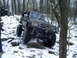 1989 Ford F-350 - This modified Toyota 4Runner is navigating a rocky, snow-covered trail.