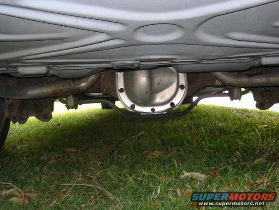 Underside view of a vehicle's rear differential and exhaust system