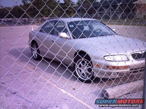 pict0114.jpg A mazda with the same rims!!! but i still dont know what kind they are.....