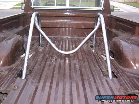 Brown 1985 Ford Ranger bed with chrome roll bar