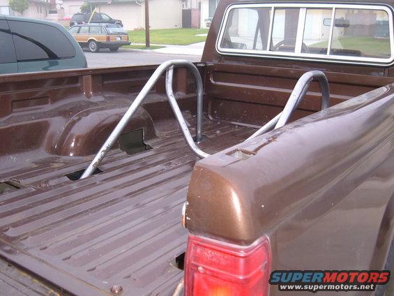1985 Ford Ranger pickup bed interior with chrome roll bars installed