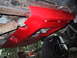 1990 Ford Bronco - Red skid plate installed on the underside of a vehicle, covering drivetrain components.