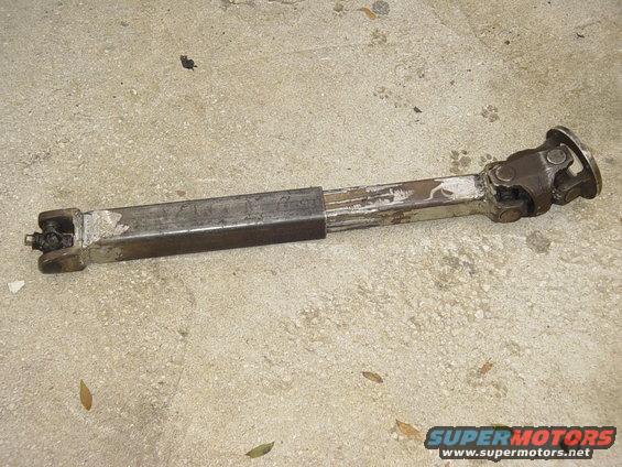 Driveshaft with two universal joints and a telescoping section