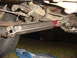 1989 Ford Bronco - Undercarriage view shows a driveshaft with fresh grease applied to a joint.