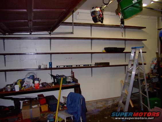 img_0209.jpg Got these up the other day. 16 foot long 2X12s. Four rows all the way to the ceiling.