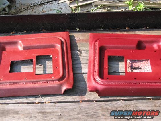 Two red interior door panels with cutouts for window cranks and door handles