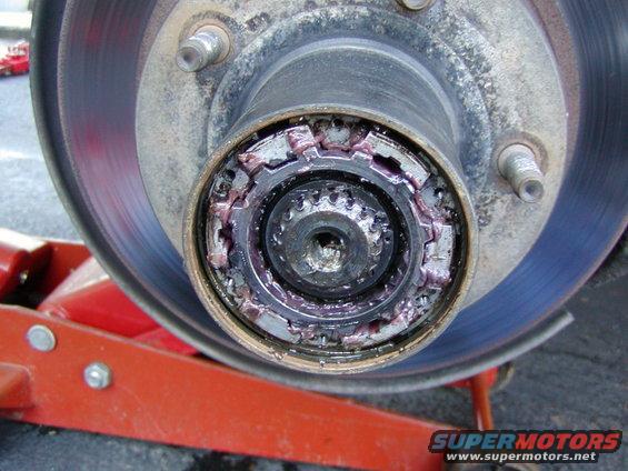 hub cover removed. here is the maunual hubs internals. remove the outer ring and inner snap ring