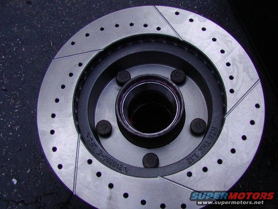 brakes-113005-038.jpg new races installed. Lay the hub back in the rotor and press the wheel studs back through. I had to use a hammer and a punch

its tuff