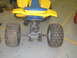 1992 Ford Crown Victoria - ATV rear axle and wheels with chain drive visible.