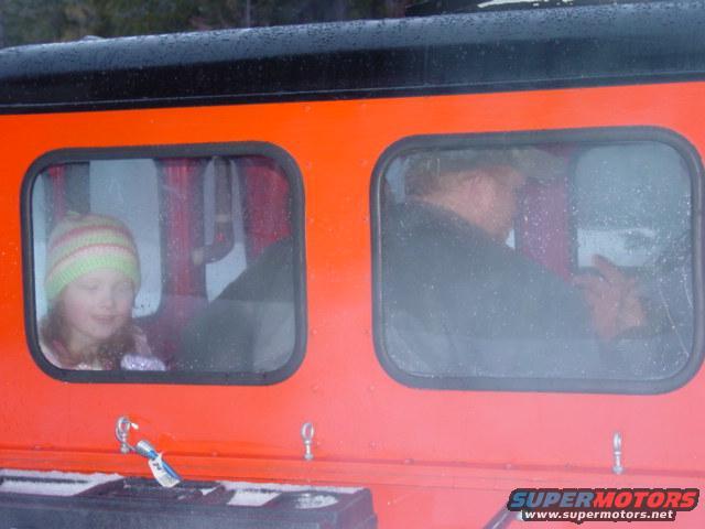 The guy giving Alfred and the kids a ride in the snowcat after Alfred helped him put the track back on.