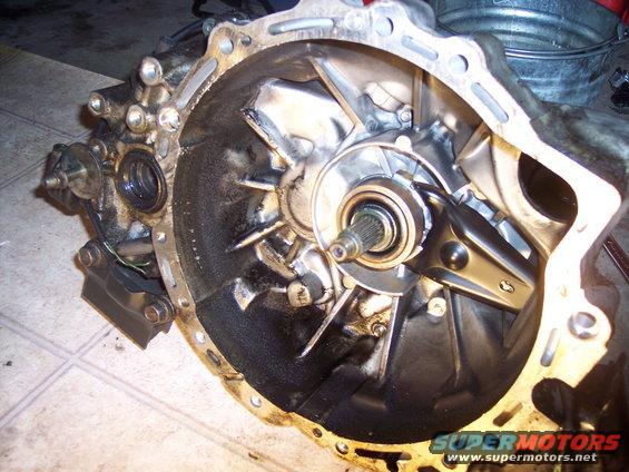 transmission bell housing with input shaft and bearing visible
