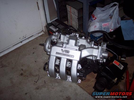 Silver V6 DOHC 24-valve engine intake manifold with K&N air filter box