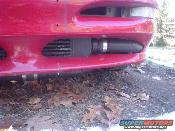 1995 Ford Probe front bumper with aftermarket intercooler and piping visible