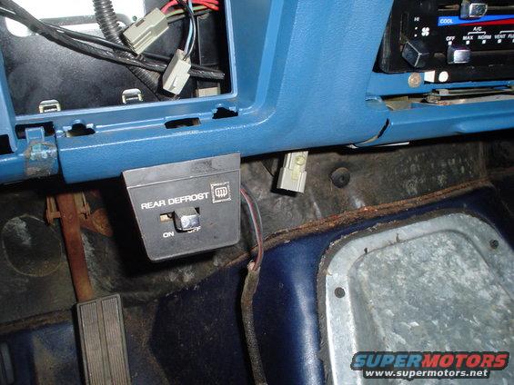 1984 Ford Bronco interior showing rear defrost switch and wiring