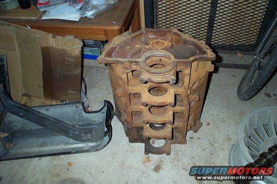 Rusted engine block with Supermotors.net watermark
