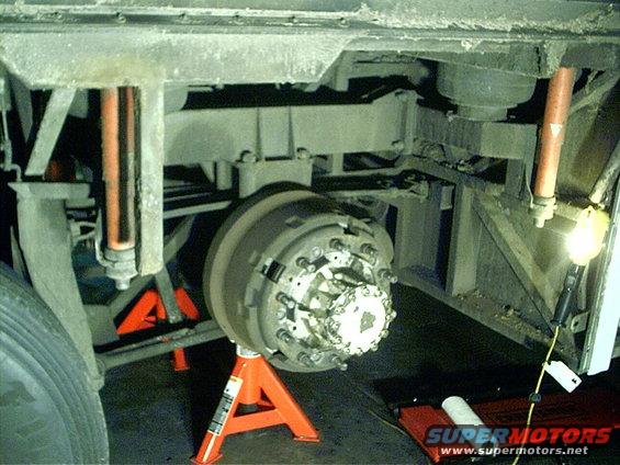 Undercarriage brake drum assembly on jack stands