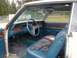 1993 Ford Bronco - Interior view of a vintage car showing the dashboard, steering wheel, and seats.