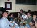 1996 Ford Probe - A group of friends enjoys a meal together at a table in a dimly lit restaurant.