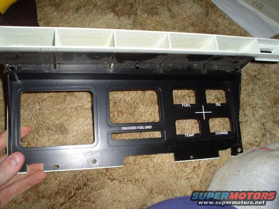 Dashboard gauge cluster with fuel, oil, temp, and charge indicators
