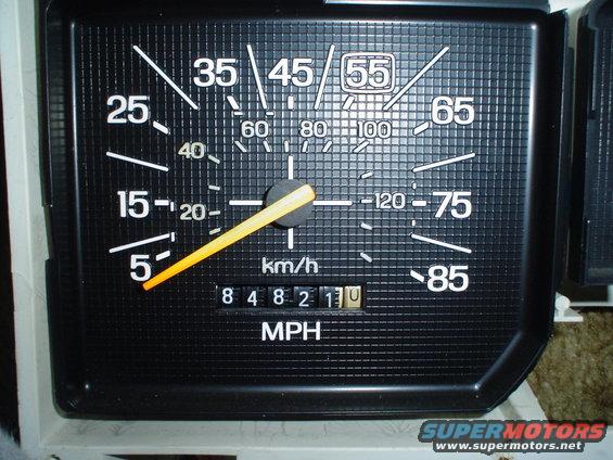 Speedometer shows 55 mph, odometer reads 84821.0. Another gauge shows km/h
