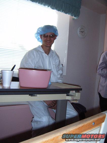 Daddy matt in scrubs before the C-section