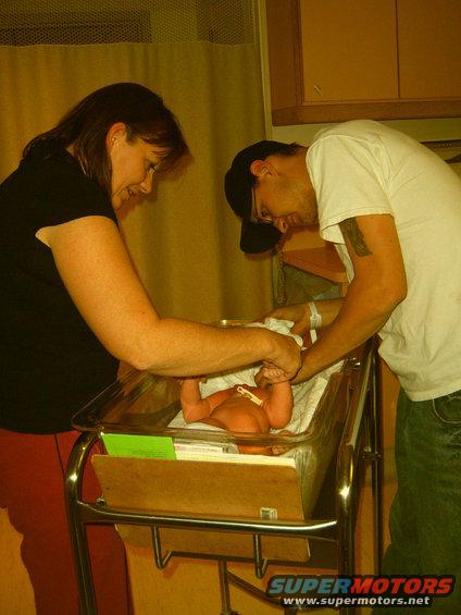 first diaper change with daddy and grandma Jackie