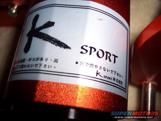 K-Sport coilover shock absorber with Japanese text and 'SPORT' label