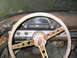 1956 Ford Thunderbird - Interior view of a 1956 Ford Thunderbird, its dashboard and steering wheel.