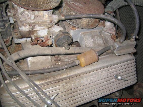 Engine valve cover with ribbed detail and fuel filter