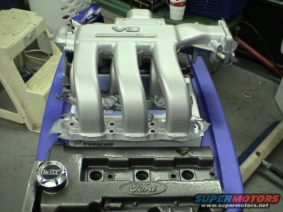 Ford V6 intake manifold and valve cover with 'Ford' logo