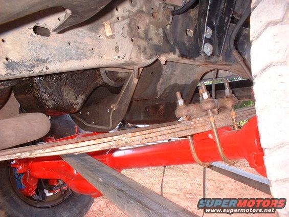 1986 Ford F-250 rear axle and leaf spring suspension, painted red