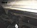 1990 Ford Bronco - Undercarriage view showing frame and suspension components, with a part number tag visible.