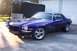 1970 Chevrolet Camaro - A 1970 Chevrolet Camaro SS in a deep purple finish is shown from a three-quarter front angle.