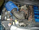 1997 Dodge 2500 - Engine bay with aftermarket cold air intake and turbocharger components visible.