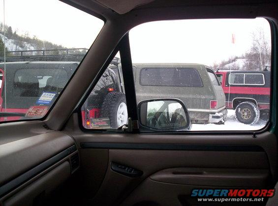 Interior view of parked SUVs in snow