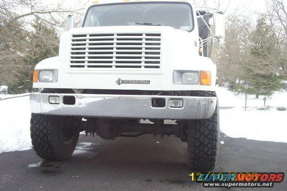 White truck front view. No year visible