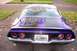 1970 Chevrolet Camaro - Rear view of a purple 1970 Chevrolet Camaro, its distinctive quad taillights and a spoiler.