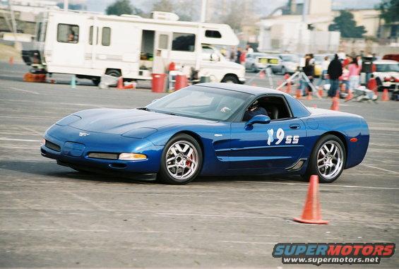 Blue Corvette C5 with racing numbers 1955 on door