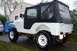 1974 Jeep CJ5 - 14 years later. Lifted, 31" Mud Terrains, Repainted, and a new gas tank installed.