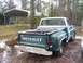 1974 Chevrolet C/K Pickup - This Chevrolet pickup truck has a toolbox in the bed and is parked in a wooded area.