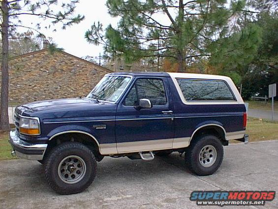 Blue and tan 1992 Ford Bronco side view