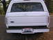 1996 Ford Bronco - removed spare tire hanger, and added slotted tail light covers, painted white.