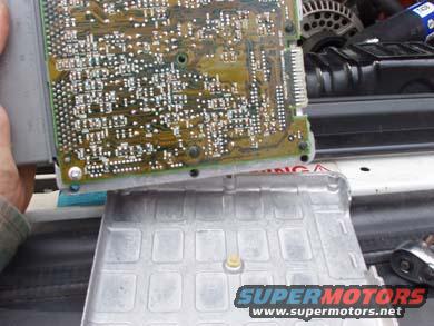 a2pcm_pieces.jpg To clean the contacts you need to dissassemble the PCM so you can access the board easily on both sides. 