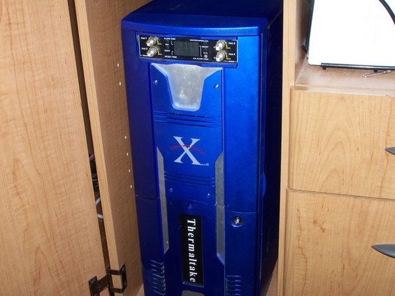 Blue Thermaltake computer tower with "X" logo