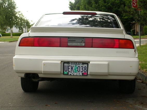 White 1989 Nissan 300ZX rear view with a spoiler and Oregon license plate UEK 038