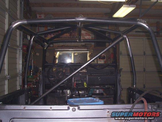 100_2634.jpg cage & brase from the back